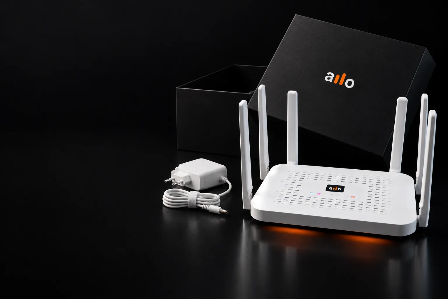 Роутер ALLO рядом с фирменной коробкой и блоком питания